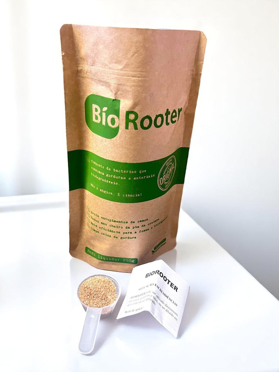 Embalagem de Biorooter Sanear Brasil com colher dosadora e folheto ao lado